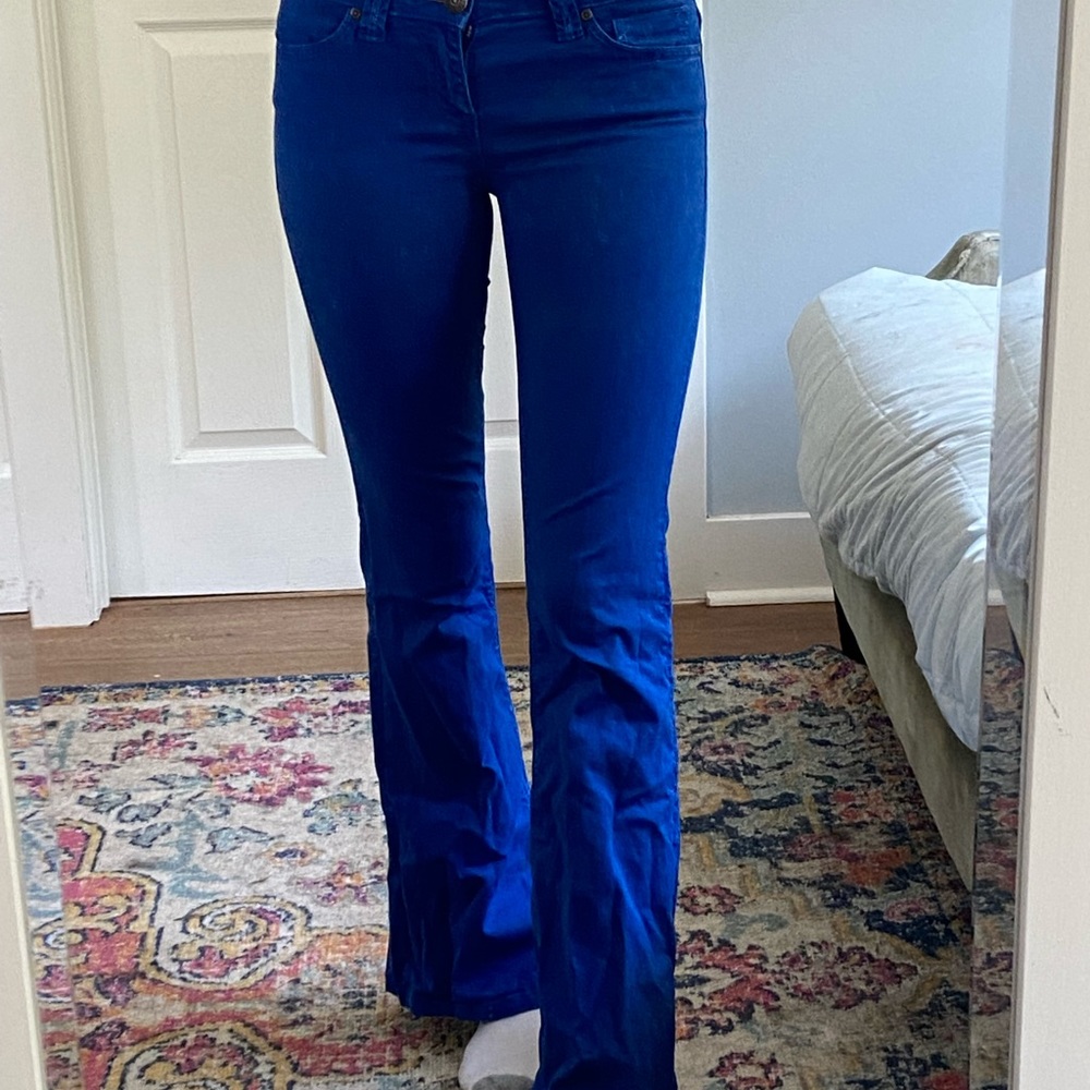 blue jeans with orange stitching
